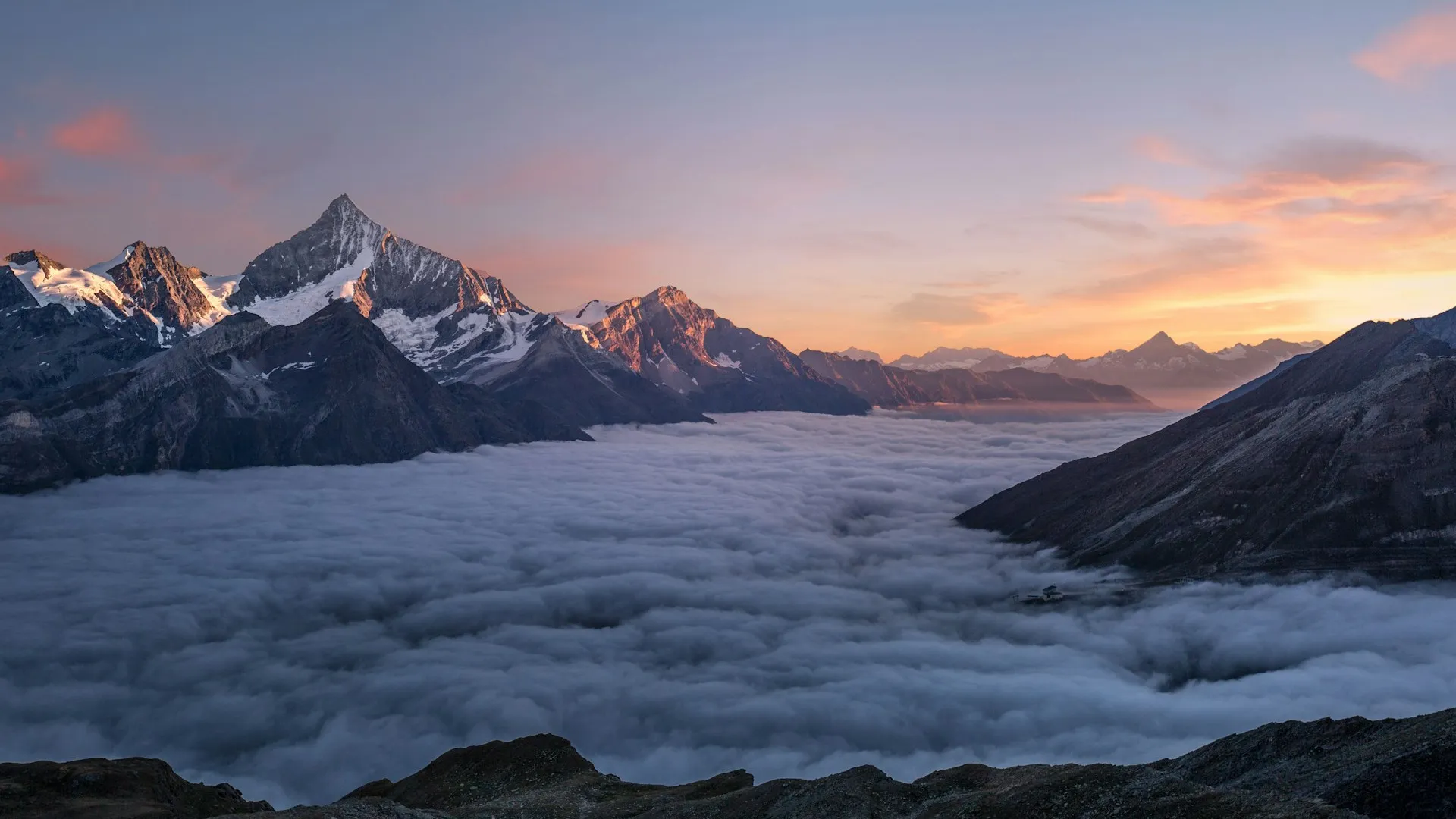 Mountain ridge above a valley in clear weather